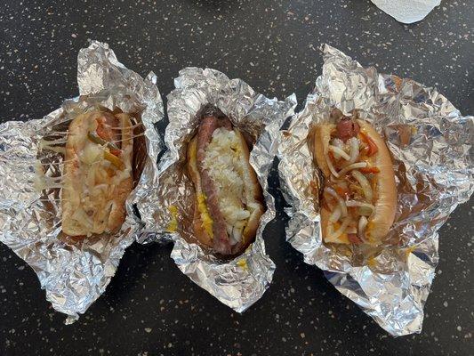 Italian sausage Wayne's way (peppers onions and mozz) Polish sausage Wayne's way (mustard and kraut) Chili cheese dog with onions