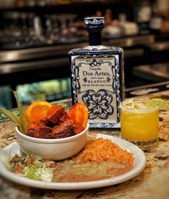 Our delicious Carnitas de Puerco Pibil and organic passion fruit margarita