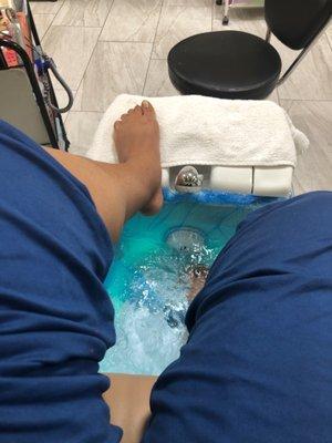 Getting a Pedi. I came here to set up an appointment for Sunday only to be welcome in getting it done now!