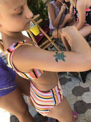 Kids tattoo event at pool