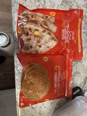 Frozen Tandoori naan and frozen masala paratha. Each package contains 5 pieces.