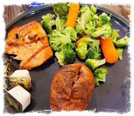 Salmon with Baked Potato and Broccoli & Carrots.