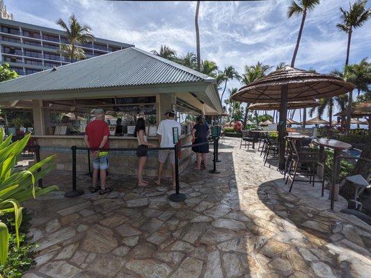 Outside the actual pool bar. Storefront.