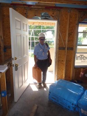 Mariano working on Habitat for Humanity home