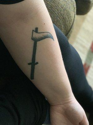 Scythe tattoo by Meagan Dare