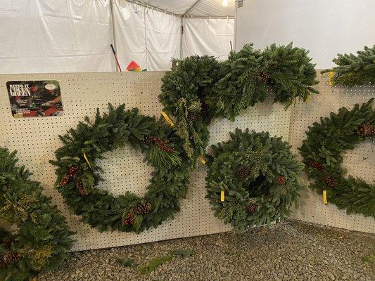 Wreathes. I bought one of the round traditional wreathes. They also had tree wreathes!