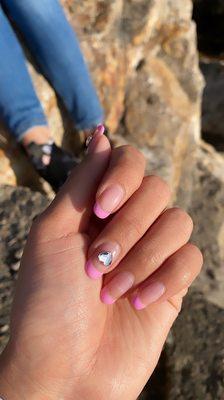 Pink french tips with heart diamonds