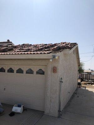 Before new roof, tear down of old roof