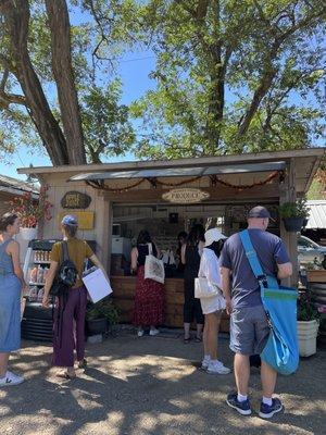 Farm stand where you buy their ready made products and weigh apples