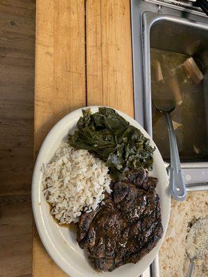 Grilled steak butter rice, collard greens