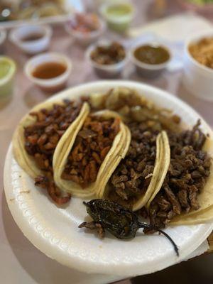 Carne asada and al pastor tacos