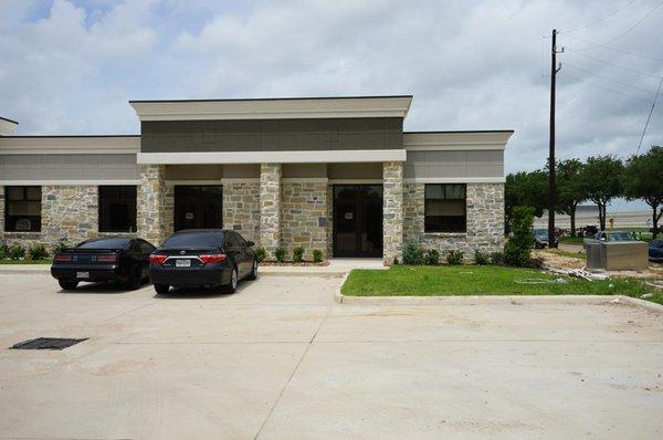 Front of Building - End unit, turn right after pulling in driveway. Then straight into building