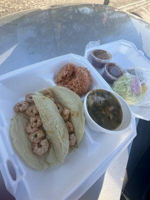 Shrimp Tacos Came with rice chorro Bens bag of lettuce n pickle onion's a few Salsas as well