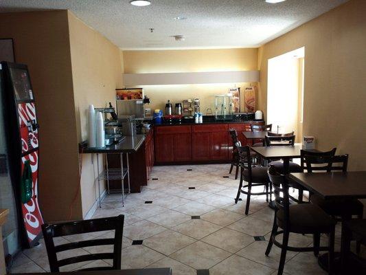 Breakfast area.  Breakfast is served 6:30 to 9:30 AM daily and includes cold cereals, breads, and waffles that you make yourself.