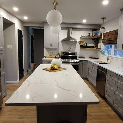 Custom kitchen with quartz countertop grey cabinets all drawers