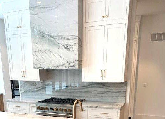 Full height backsplash plus a stunning hood cover!