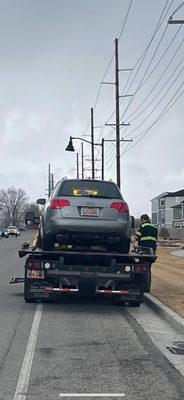 Car has been put onto the truck! Great guys!