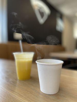 House blend coffee (small) next to fresh pineapple juice