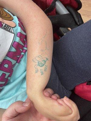 The owner drew tattoos for our nieces so they could be part of the Bee tribe.