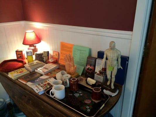 In Waiting room, various Wellness Books, clean cups for water & tea