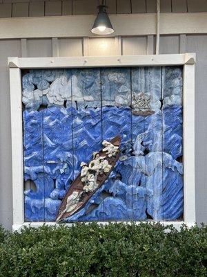 Outdoor bas relief carving honoring Outer Banks Lifesaving Crews.