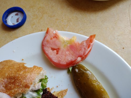 Couldn't eat this tomatoe and I doubt the person who served it would eat it either.