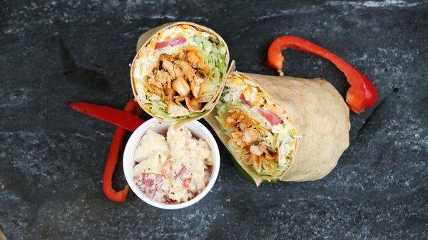 Buffalo Chicken Wrap- grilled chicken in a spicy hot wing sauce, topped with cheddar & pepper jack cheese, lettuce, tomato, celery and bleu