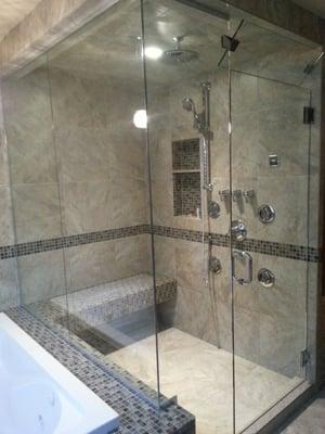 Steam shower with multiple body jets in a bathroom remodel