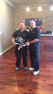 SynergenX had the pleasure of giving our lucky raffle winner a signed authentic JJ Watt helmet!!