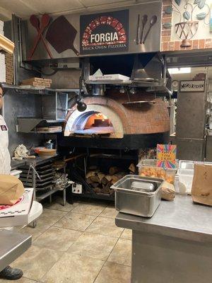 You know it's gonna be good when you see this type of pizza oven