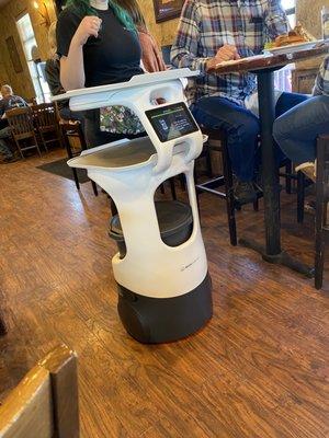 A robot who serves the food.