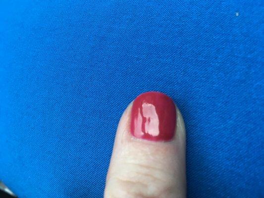 Nail polish applied unevenly over nail and very thick.  It never would dry.