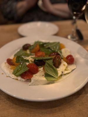 Mozzarella, basil, tomatoes. Olive oil & pepper