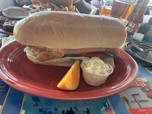 Huge hand breaded walleye sandwich