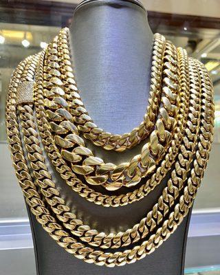 14k Gold Cuban Link Chains with diamond locks, different gram weight, and style!