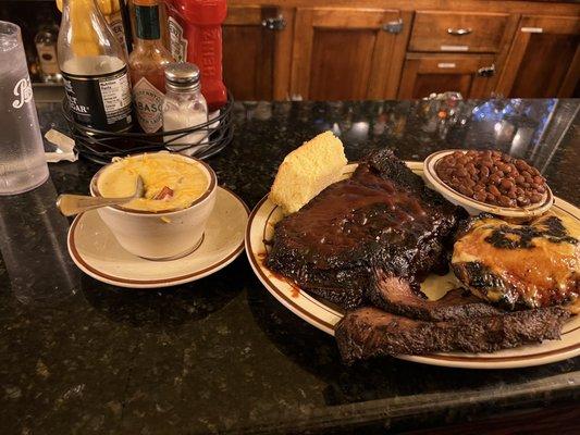 Overcooked BBQ platter and undercooked chicken re-served after a couple minutes under a broiler.