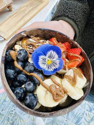 Blueberry, banana, almonds, strawberry and almond butter on Acai.