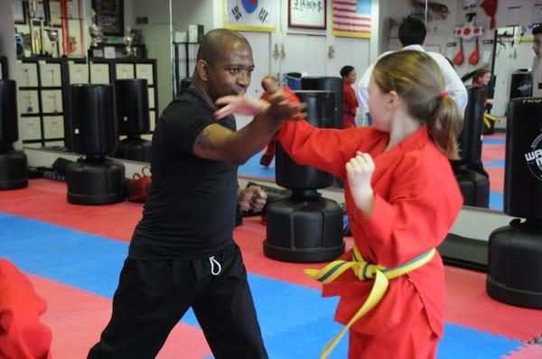 Austin receiving one on one instruction from Master Douglas