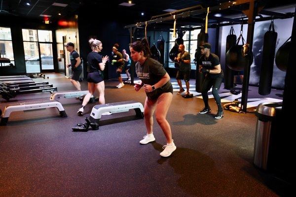 Fitness stations incorporate treadmills, rowers, and weights