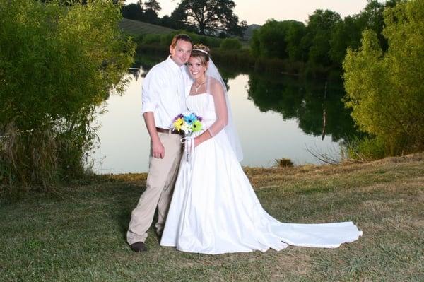 Post wedding photos are perfect with the reflection of the 2 acre pond.