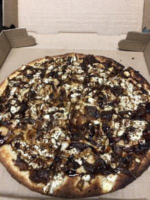 Caramelized onion, goat cheese, and fig glaze pizza