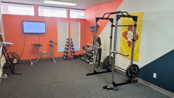 Free weights and Squat rack in the Gym