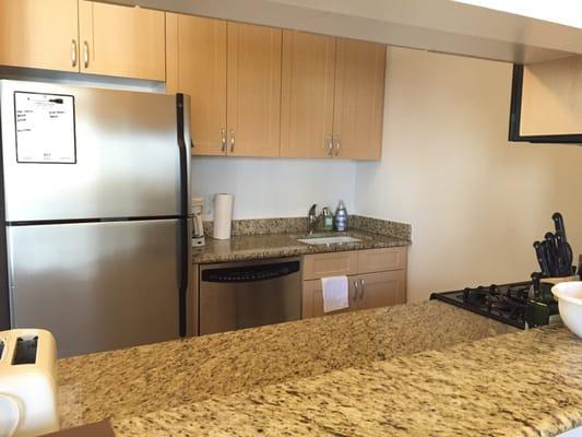 Kitchen with granite countertops.