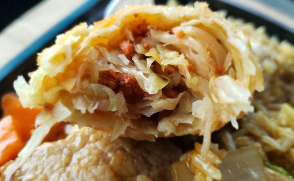 Specks of pork in the egg roll.