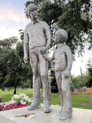 Iconic statue by the rose fountain of Steven Stayner and Tommy White