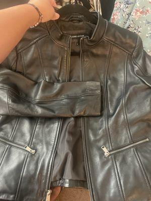 This is the leather jacket that the sticker ripped the leather off