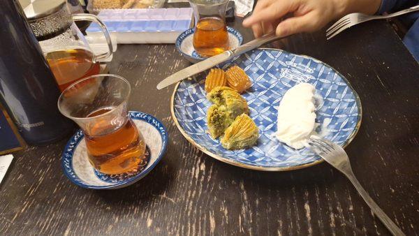 So how do you serve Turkish ice cream?  Turkish tea, pistachio midye baklava, Tulumba and a single slice of Dondurma.