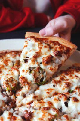 Hot Stuff: Pepperoni, Beef, Italian sausage, Jalapeno Peppers, Onions, and 100% Mozzarella Cheese