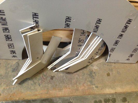 .5" 6061 aluminum plates cut into various brackets