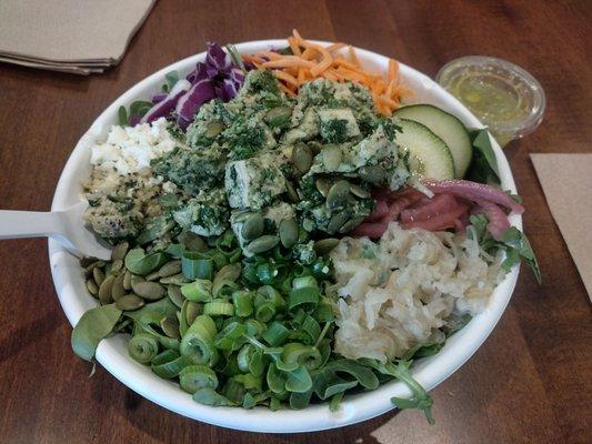 Byrd Detox salad with pesto chicken salad and lemon ginger dressing.